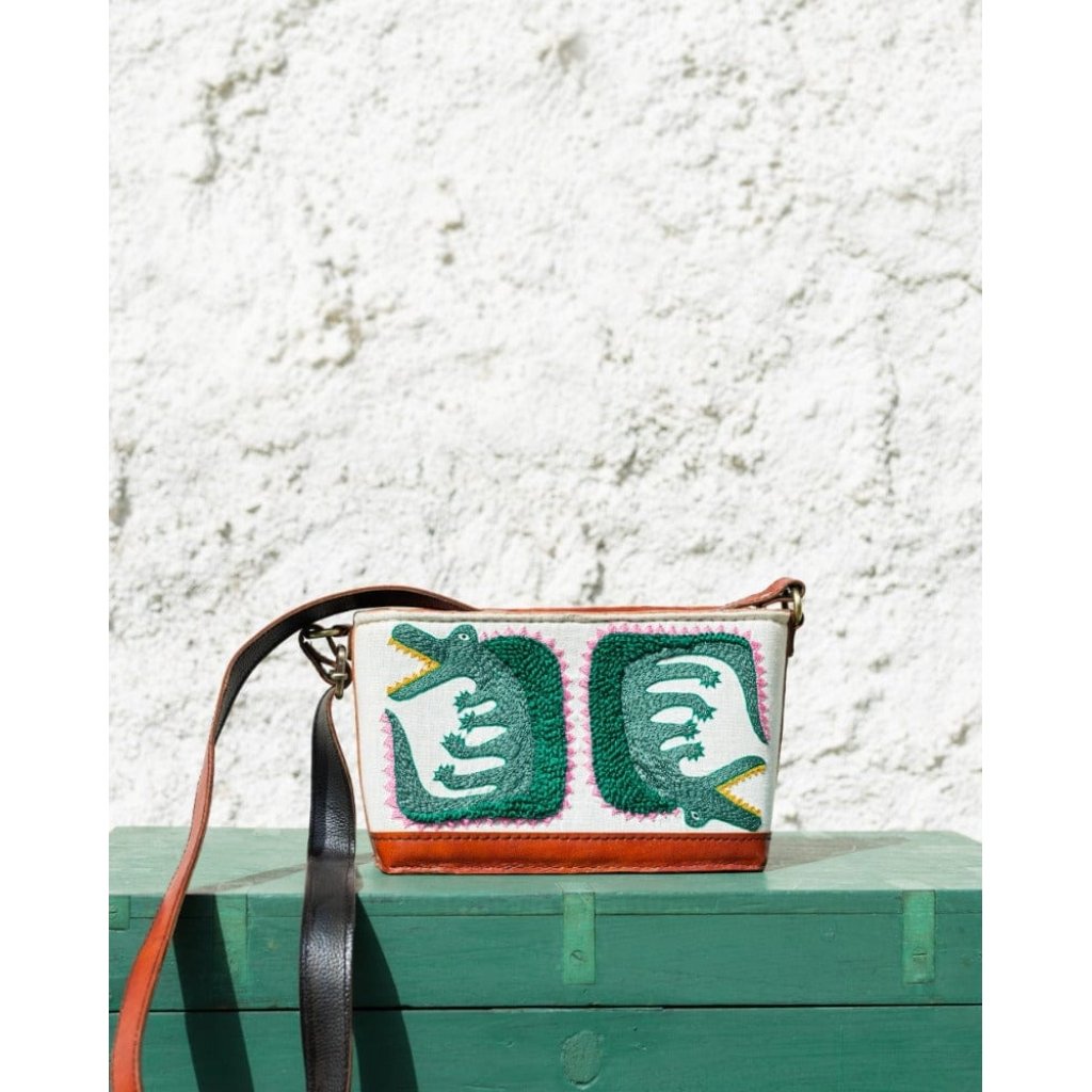 Crocodile embroidered leather sling