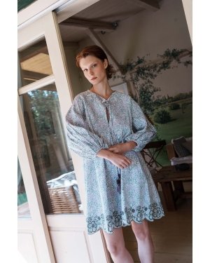 Green and lilac printed poplin dress with schfflie hemline