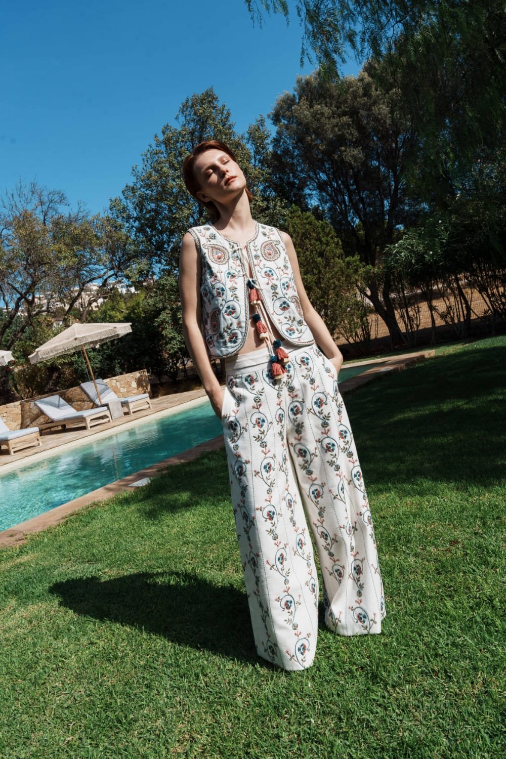 White textured fabric paisley embro