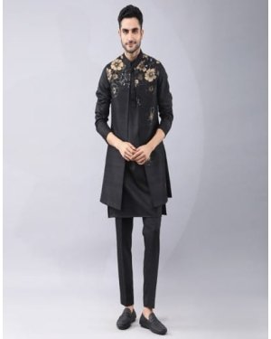 Placement printed Bundi Jacket with hand embroidery, It is paired with kurta (self dori work on collar, placket and cuffs) and pants.